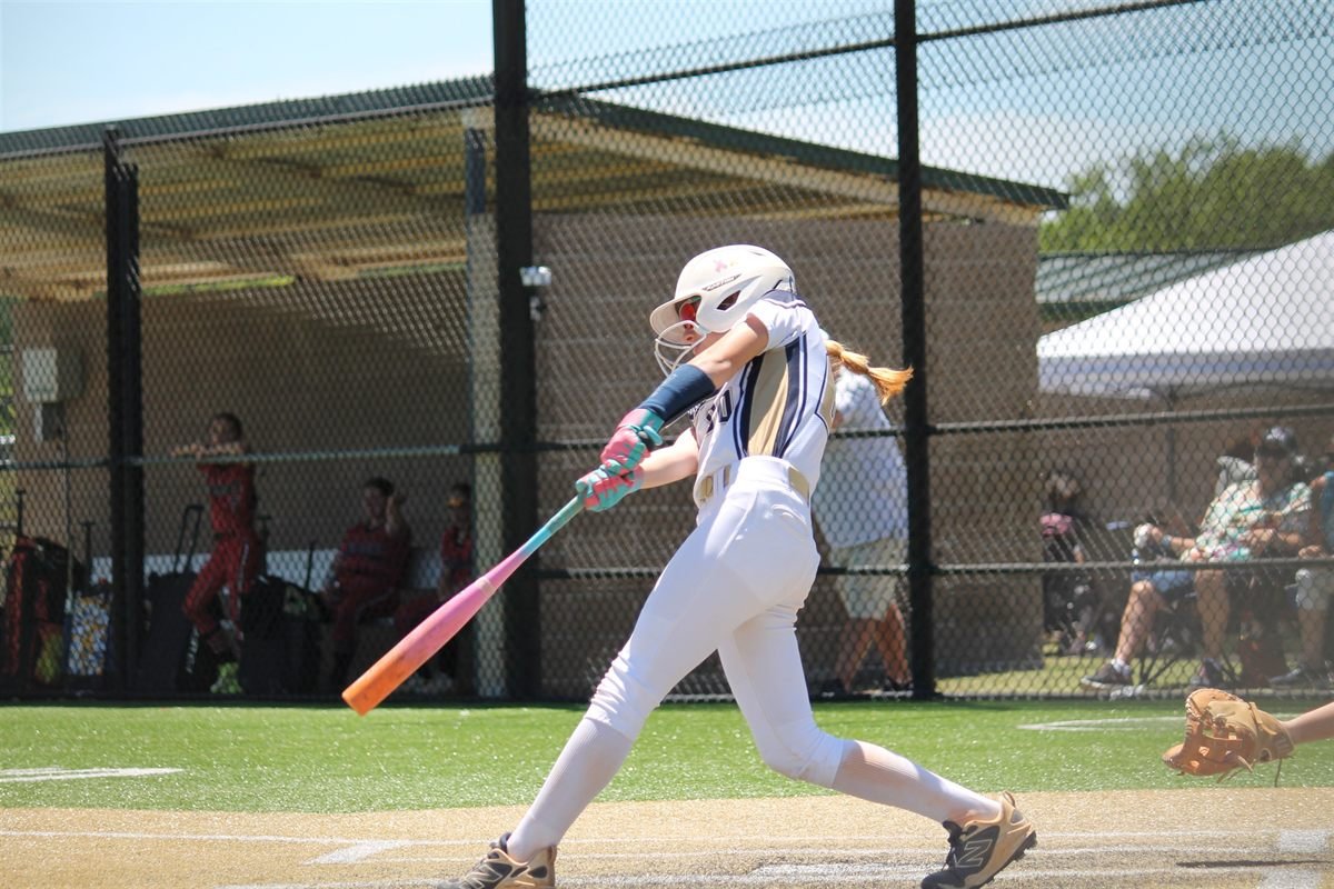 A Fury batter driving through the ball at the plate