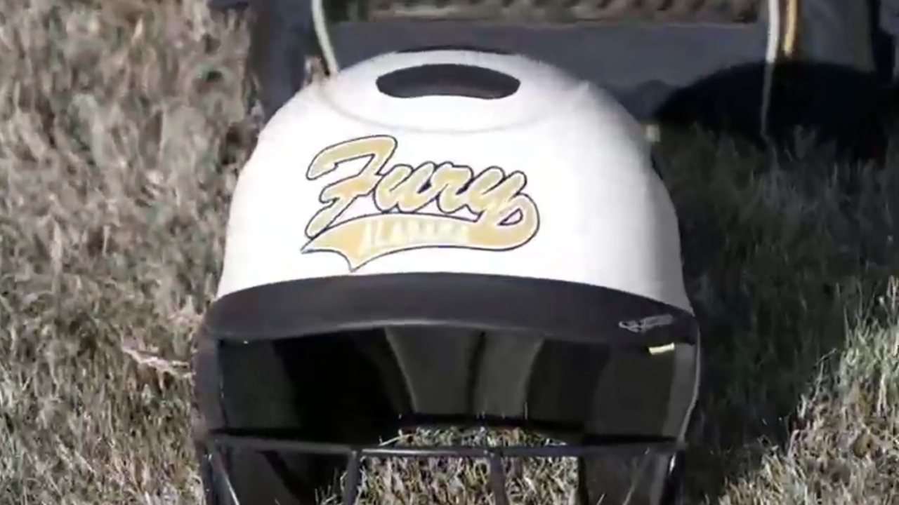 Alabama Fury batting helmet resting on the field